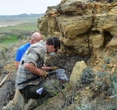 State geologist Ed Murphy and geologist Levi Moxness collect coal from seams along buttes in the Little Missouri Badlands.