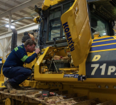 Allen Cherrington conducts a machine inspection during the first round of the event.