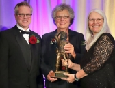 Mark Compton, AEMA and Laura Skaer, AEMA accept Prazen Living Legend of Mining Award.