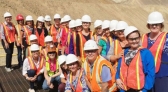 Nevada Chapter of the International Women's Forum tour group on the viewing stand at Phoenix Mine.