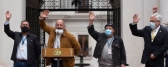 Chilean ex-miner Mario Sepulveda shouts next to Samuel Avalos and Daniel Herrera and Chilean President Sebastian Pinera.