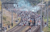 Activist block tracks for coal transportation during a protest against the plans to clearing and grubbing the Hambach Forest.
