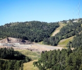 Materials taken from active mining areas is being used to reclaim formerely mined areas at the Wharf mine.