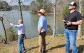 Stephen Blankenship, Brooks Blakey, and Jordan McGehee monitor the drone surveying mission