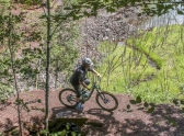 Cory Oseland, of Duluth, rides Fractured Falls, a trail at Redhead Mountain Bike Park in Chisholm.