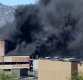 Heavy black smoke pours off a fire in a secondary crusher unit at the Freeport McMoran Sierrita Mine Complex.
