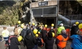 Victims’ families prepare to release 29 yellow balloons at the entrance to the Pike river mine