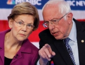 Democratic presidential candidates, Sen. Elizabeth Warren and Sen. Bernie Sanders, talk during presidential primary debate.