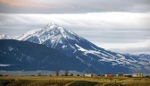 This Nov. 21, 2016, file photo shows Emigrant Peak towering over the Paradise Valley in Montana north of Yellowstone.