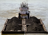 Four barges ship coal up the Monongahela River.