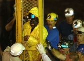 The third miner emerges from the Quecreek mine as rescue workers on Sunday, July 28, 2002, began pulling nine miners one-by-one.