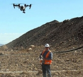 Marigold Mine Chief Surveyor Alan Clayson lands a drone near a leach pad at the Marigold Mine in Valmy, Nev.