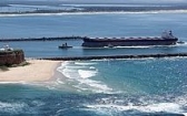 A bulk carrier entering the Port of Newcastle.
