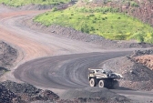 A haul truck moves chunks of taconite ore at the United Taconite mine in Virginia.