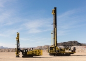 Komatsu's 44XT (left) and 77XR drills pictured at the company's Arizona Proving Grounds.