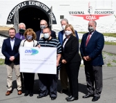 Officials pose for a photograph at Pocahontas Exhibition Mine during a presentation for a grant award. (Photo: Jessica Nuzzo)