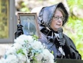 Plymouth Historical Society member Mary Beth Kondrad holds a photo of her great-great grandfather.