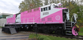 Wabtec unveiled the FLXdrive, world’s first 100% battery-powered, heavy-haul locomotive donning Roy Hill’s iconic pink livery.