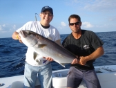 16-year-old Jonathon reels in a big one during his fishing wish trip to Nags Head, NC.