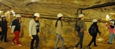 Visitors make a turn in the Hazel-Atlas Mine at Black Diamond Mines Regional Preserve in Antioch.